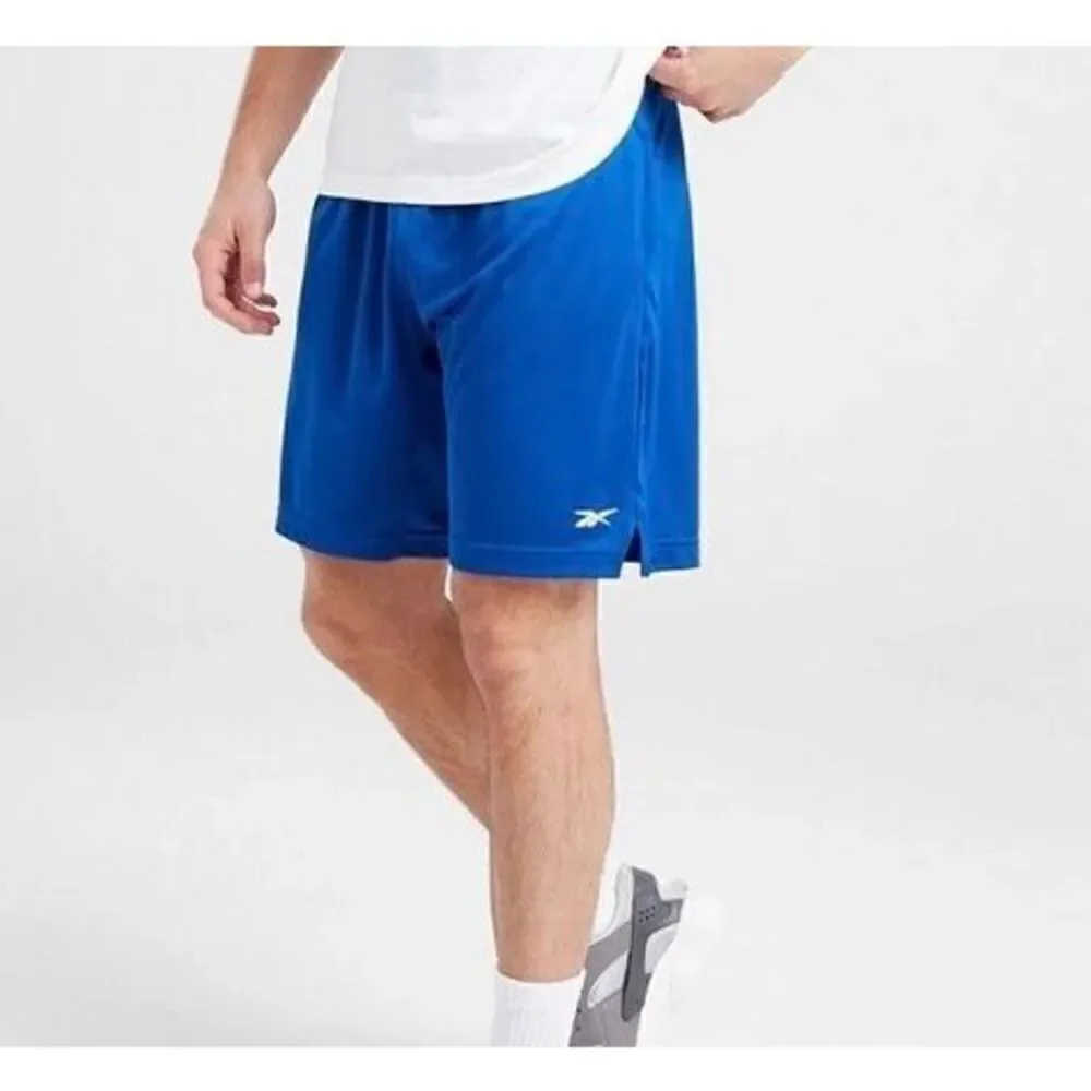 REEBOK - NWT - M Sz Medium Speedwick Active Shorts in Victor Blue. POCKETS!